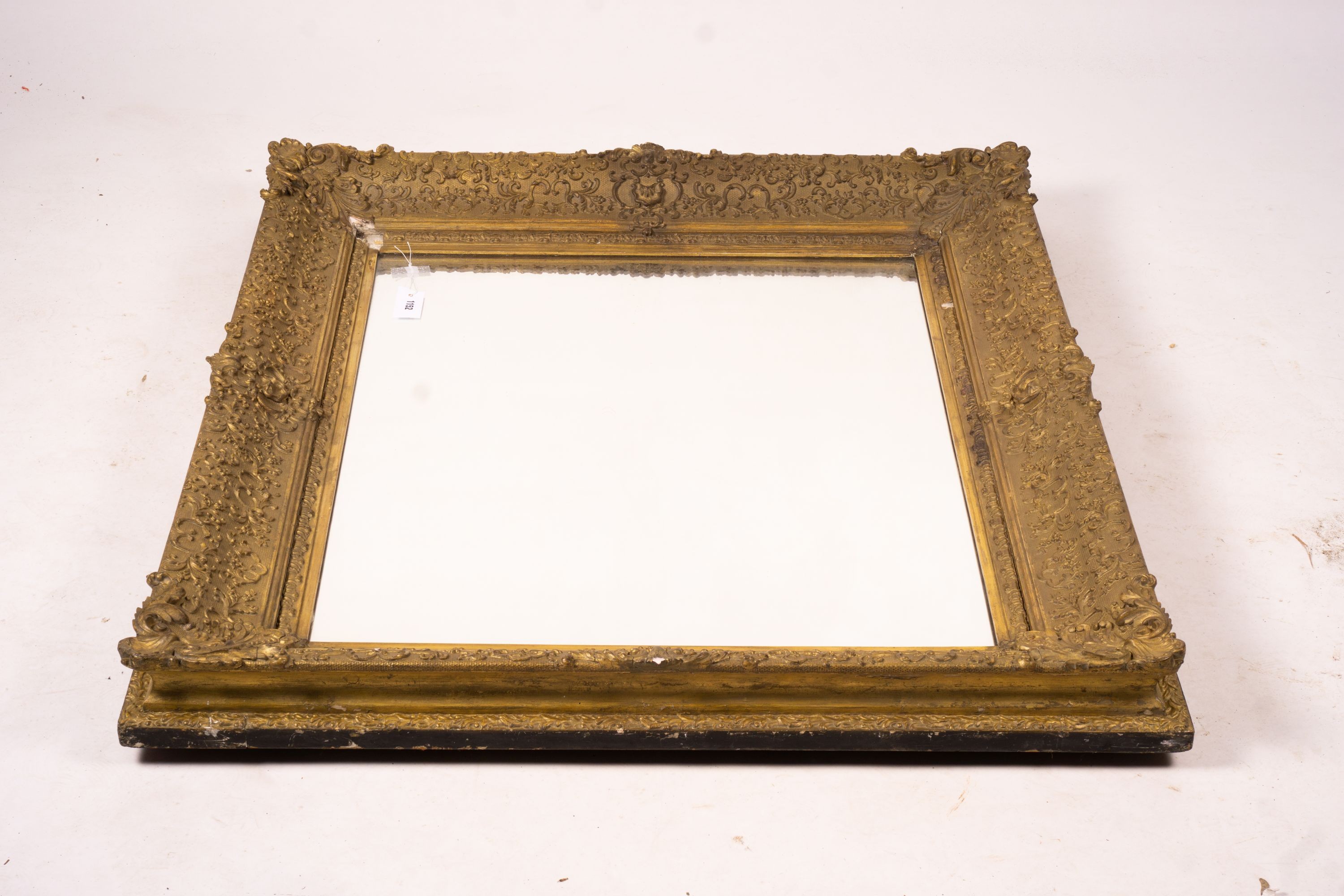 A Victorian gilt gesso wall mirror, W.104cm H.124cm